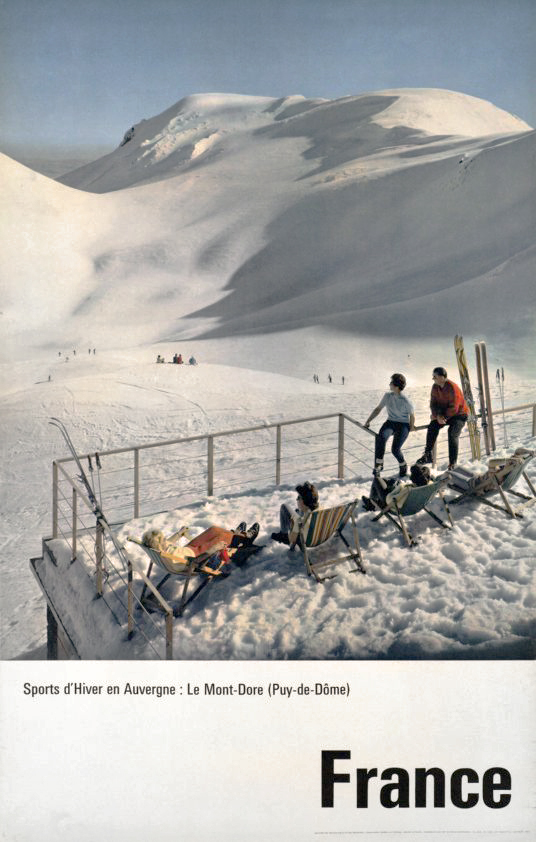 Pays du Dome poster with people resting on lounge chairs looking a snowy mountain