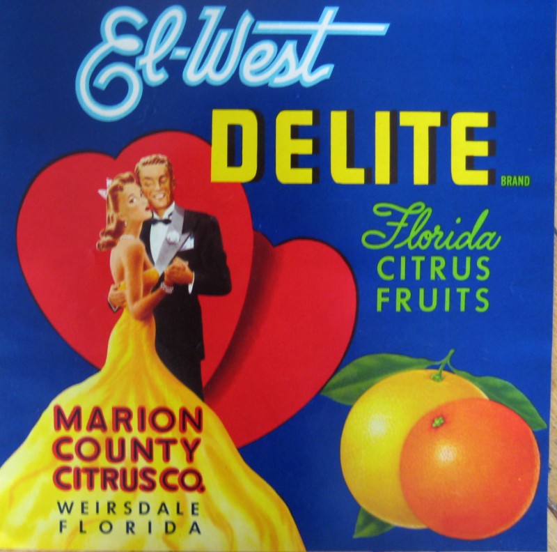 El-West Delite orange label with a dancing couple in front of two heart