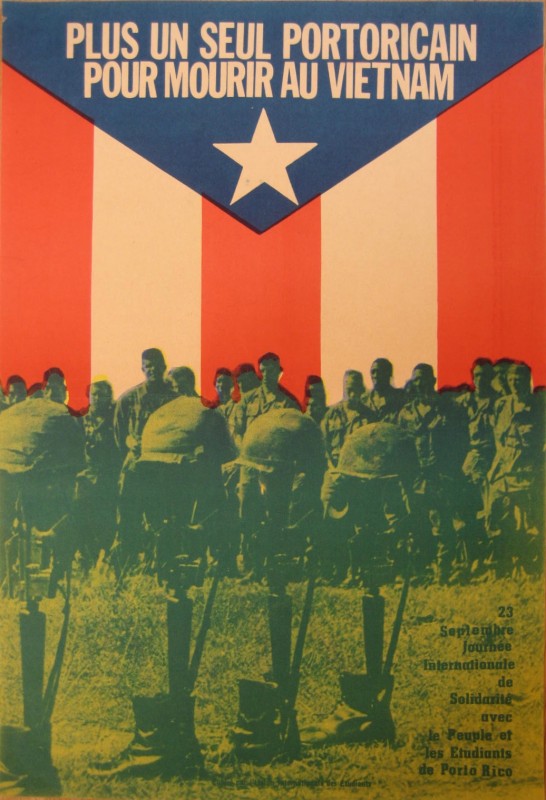 Soldiers with a puerto rican flag