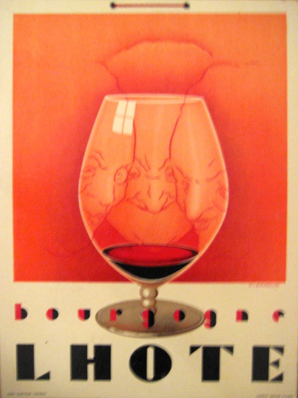 A brandy snifter with three faces looking into it