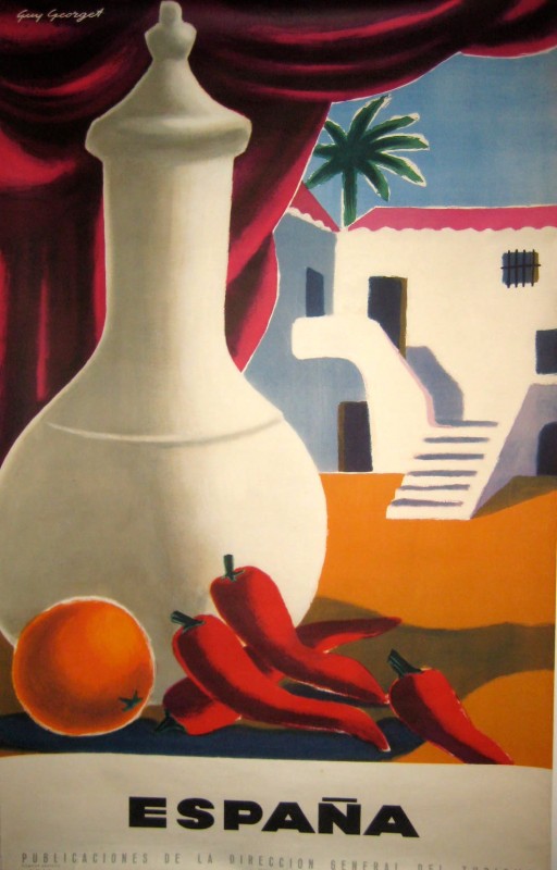 A vessel , orange, and red peppers with a building in the background