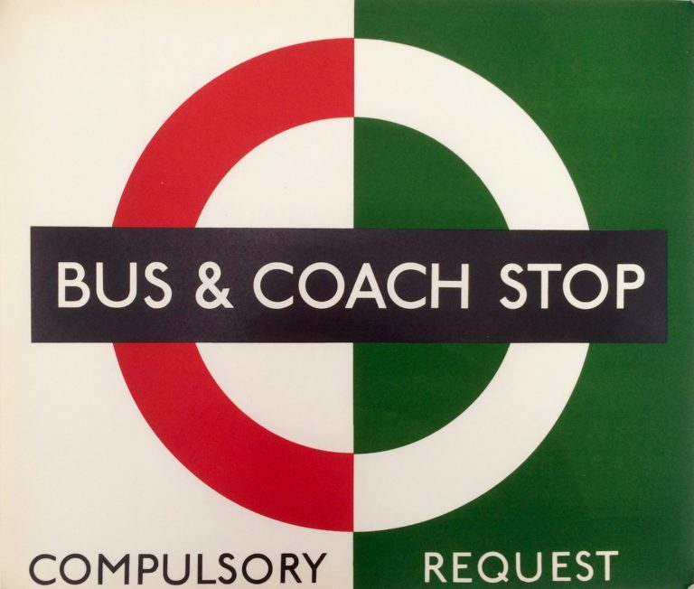 Bus and Coach Stop paper sign with London Transport logo circle with cross bar saying bus and coach stop. White and green background