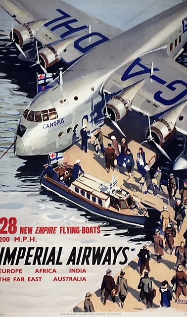 A flying boat loading passengers at dock