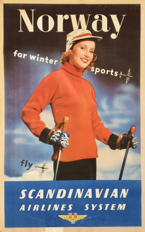 A woman holding ski poles