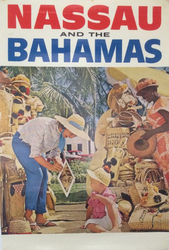 Nassau Straw Market with woman and child inspecting goods at the market with a seller looking on