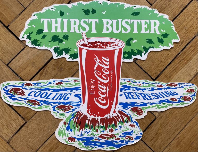 Thirst Buster Coca Cola die cut; Coca Cola drink and straw surrounded by text Thirst Buster Cooling Refreshing